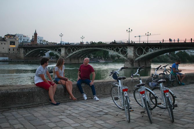 Sunset Guided Bike Tour in Seville - Triana: pottery and tiles, plus flamenco culture that you can feel