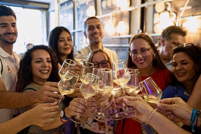 Tapas and Wine Tasting Tour in Seville Small Groups and Jewish Quarter - Stop 1 around the cathedral area: Giralda views and quick landmark context