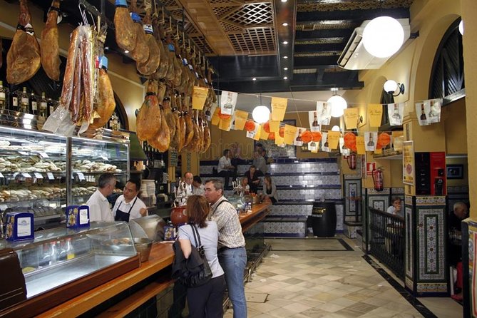 Tapas and Wine Tasting Tour in Seville Small Groups and Jewish Quarter - Plaza Nueva and Avenida de la Constitución: where Seville funnels pedestrians