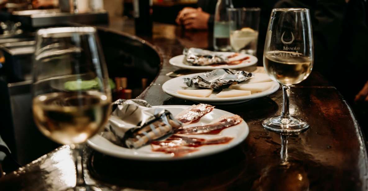 Triana: Authentic Flamenco & Tapas Tour - Triana and Your Abacería Start: Manzanilla, Mojama, and the Neighborhood-Store Story